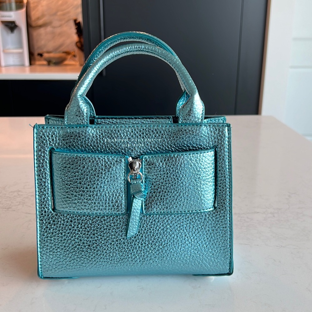 Brandon Blackwood metallic blue kuei bag